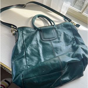 Gorgeous green leather Hobo bag does have some staining on inside and on leather